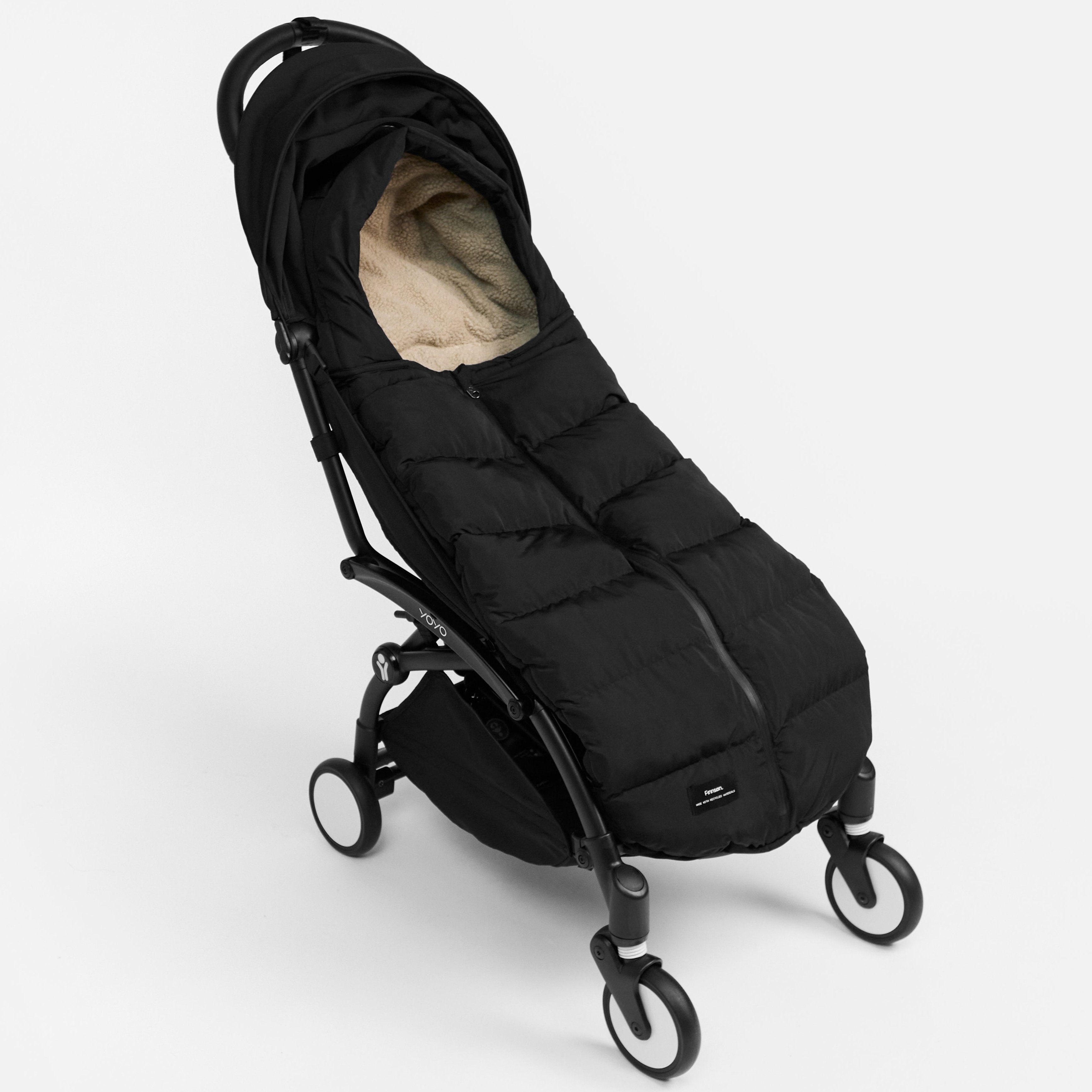 FINNSON ALMA BLACK FOOTMUFF SIDE SHOT ATTACHED TO PRAM