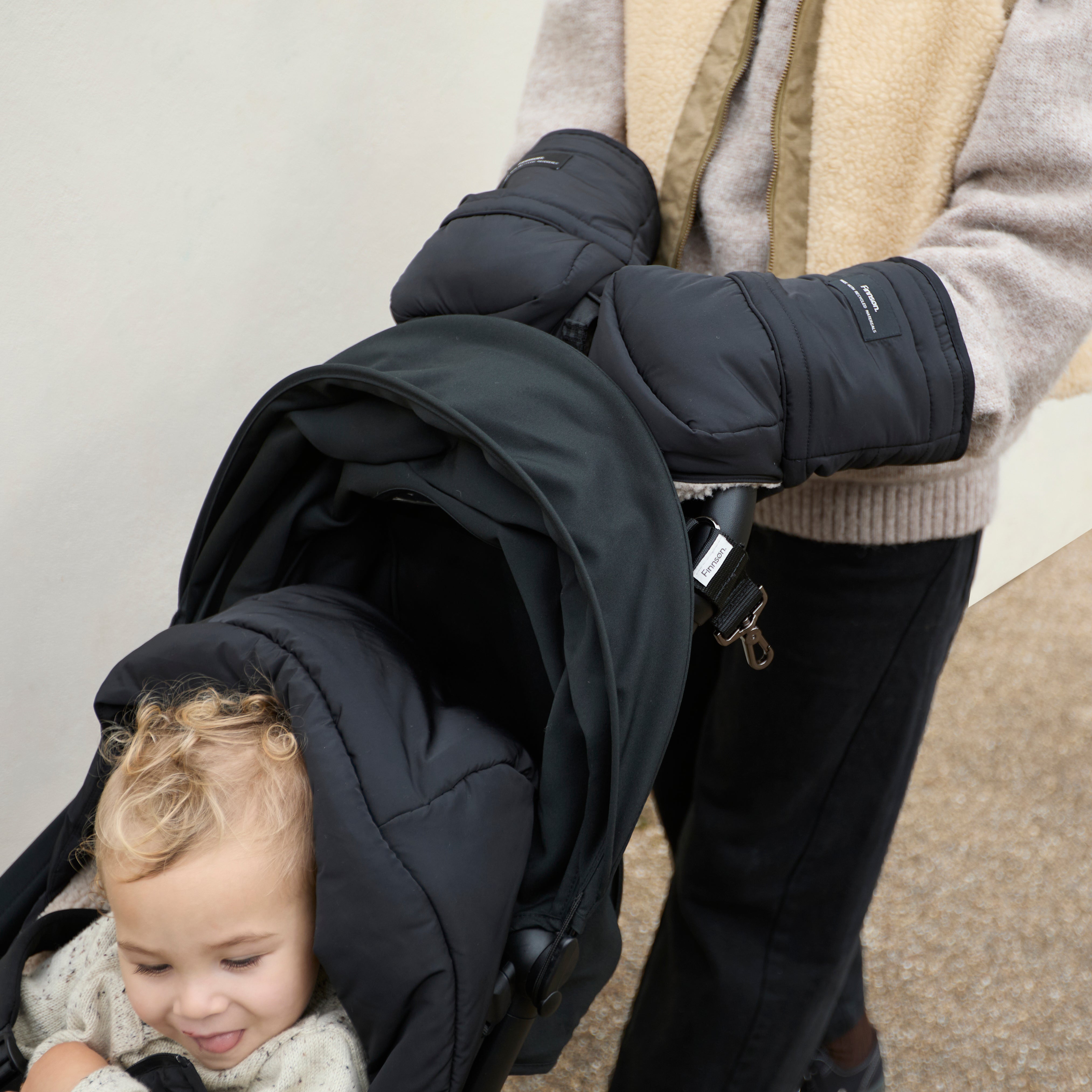 FINNSON ASTIRD BLACK STROLLER MITTENS WITH BABY AND MODEL