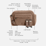 Freya mocha borg bag with multiple feature callouts and dimension labels on a light gray background. The bag has two detachable crossbody straps, a side D-ring attachment, five pockets, and is shown with text annotations describing its features and dimensions.