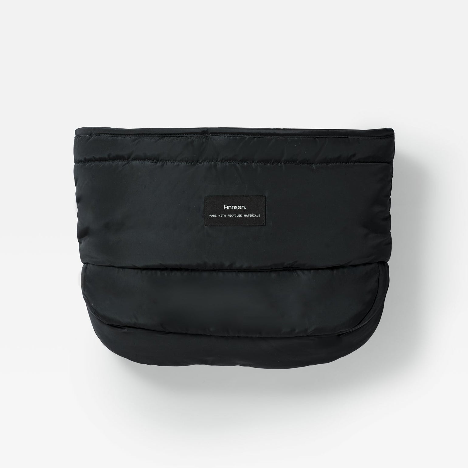 Agnar black puffer-style stroller mitten with a small rectangular brand label on the front, photographed against a clean white background.