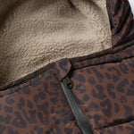 Close-up detail shot of the zip on the alma universal footmuff in chocolate leopard