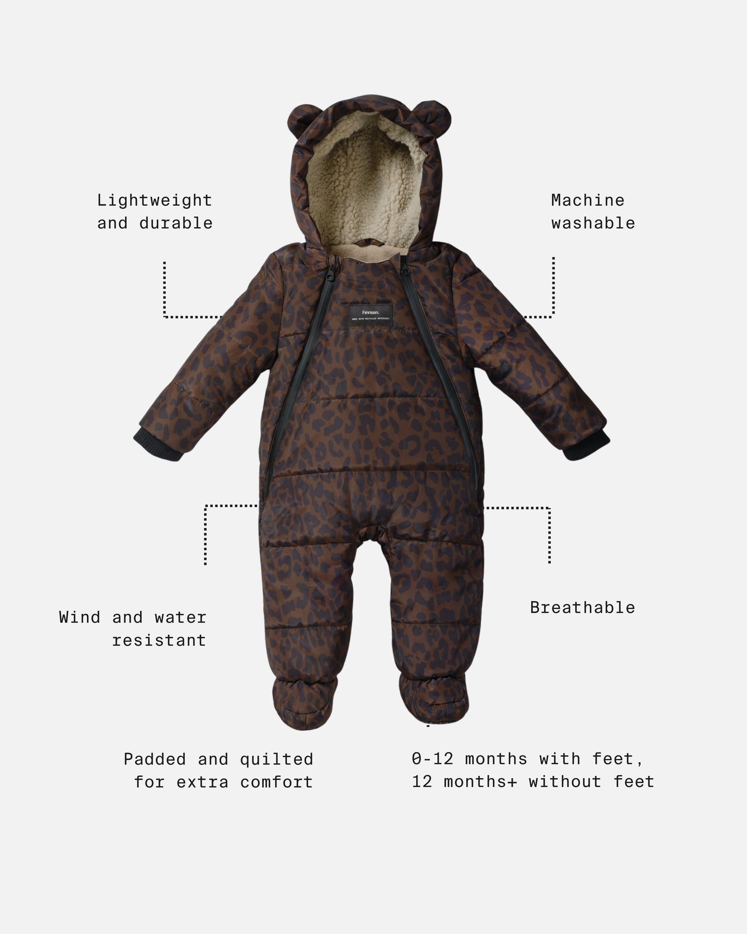 Anders choco leopard print snow suit, featuring a plush cream fleece lining and bear ears on the hood. The image includes text callouts with dotted lines pointing to features like 'Lightweight and durable', 'Machine washable', 'Wind and water resistant', 'Breathable', 'Padded and quilted for extra comfort', and '0-12 months with feet, 12 months+ without feet'.