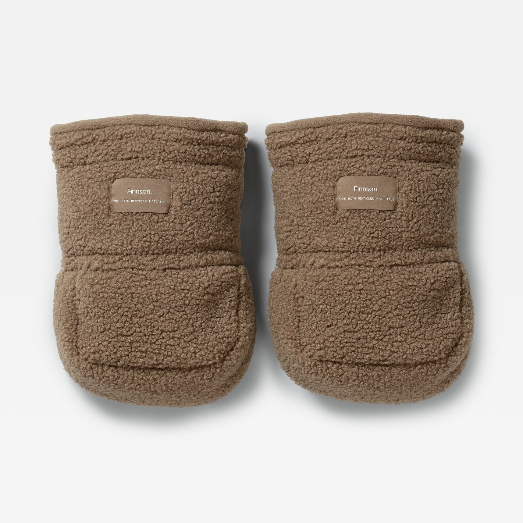 A pair of Astrid mocha borg universal pram stroller mittens, displayed against a light gray background.