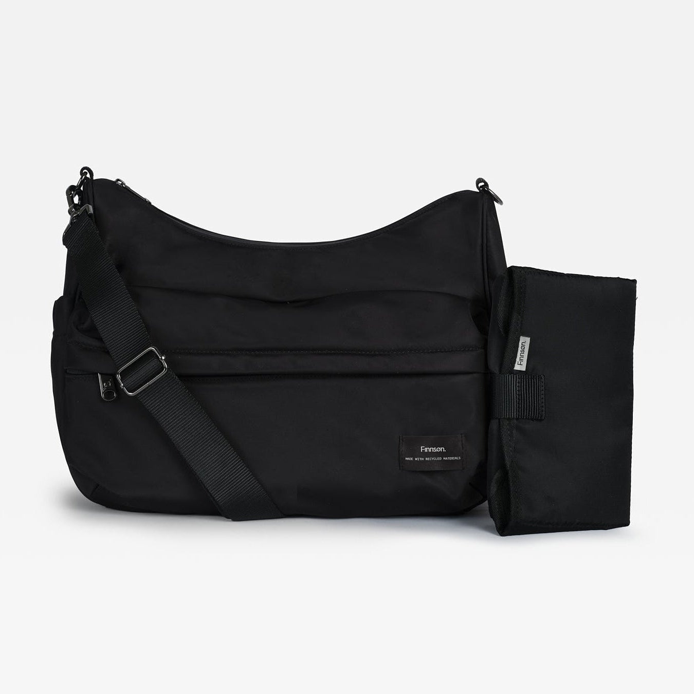A black nylon shoulder bag with an adjustable strap and a matching black pouch attached to the side, displayed on a clean white background.