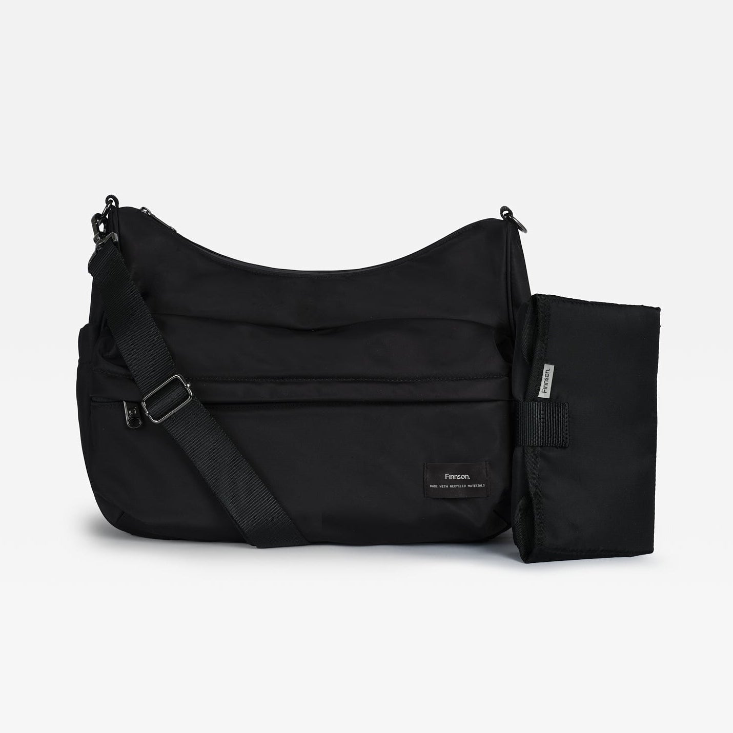 A black nylon shoulder bag with an adjustable strap and a matching black pouch attached to the side, displayed on a clean white background.