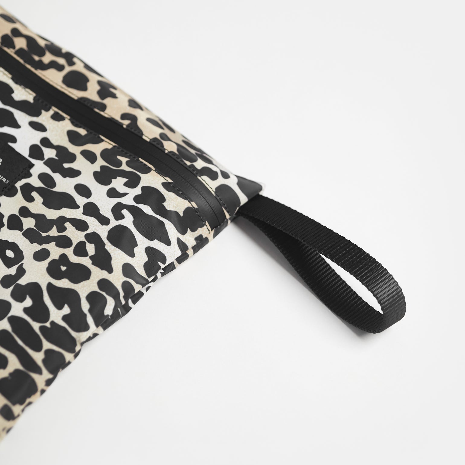 A close up look of Elias leopard print wet bag