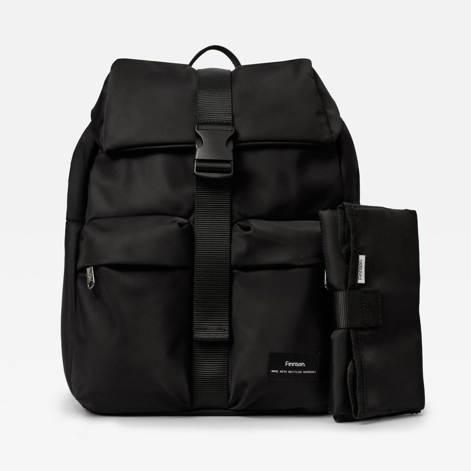 Elise Black changing backpack with a small black changing mat on a light gray background