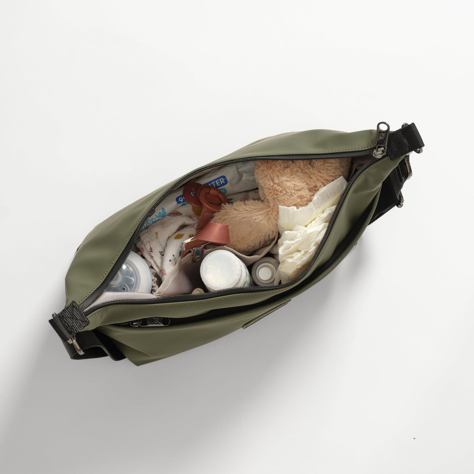 Fia khaki stroller organiser bag with various items on a white background
