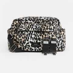 An oversized stroller organiser with a leopard print design, featuring multiple compartments and stroller clips.