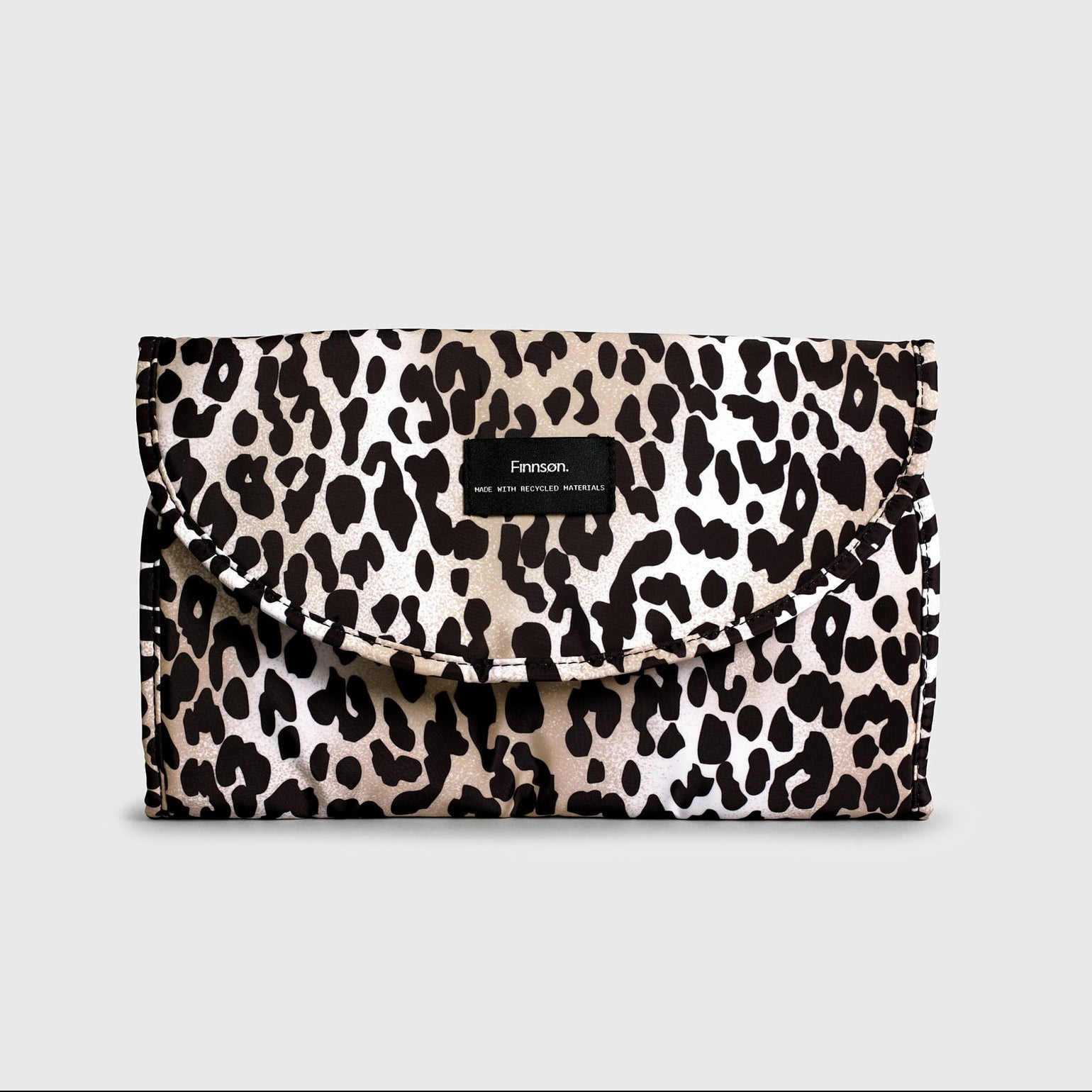 Oslo leopard print changing mat on a light gray background