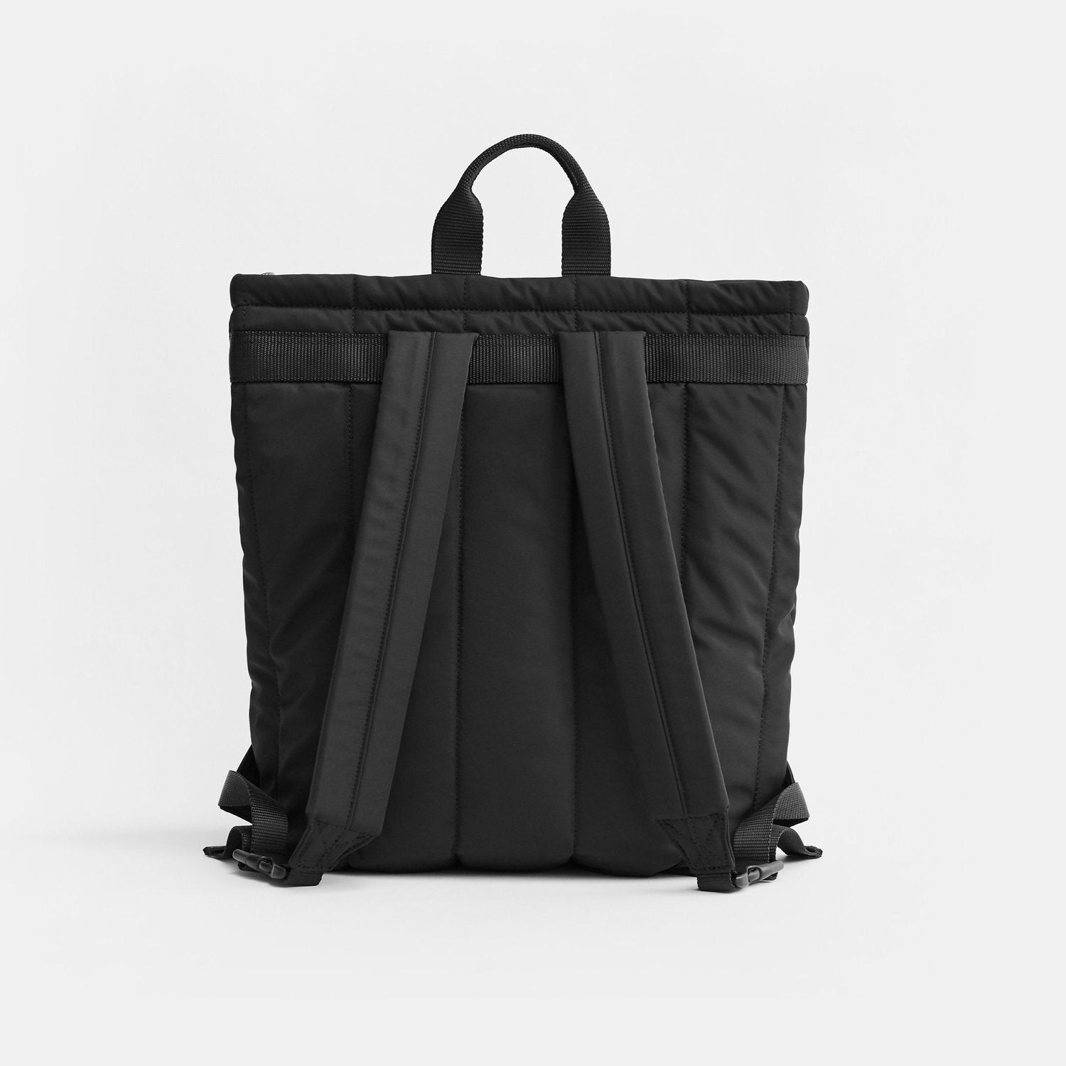 Back view of the Rae Black Eco Changing Backpack, showing its padded shoulder straps, carry handle, and adjustable stroller attachment straps.