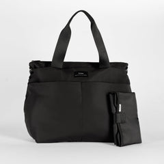 Sigrid Black changing bag with a matching padded black travel changing mat, showcasing a coordinated baby changing set designed for convenient diaper changes on the go.