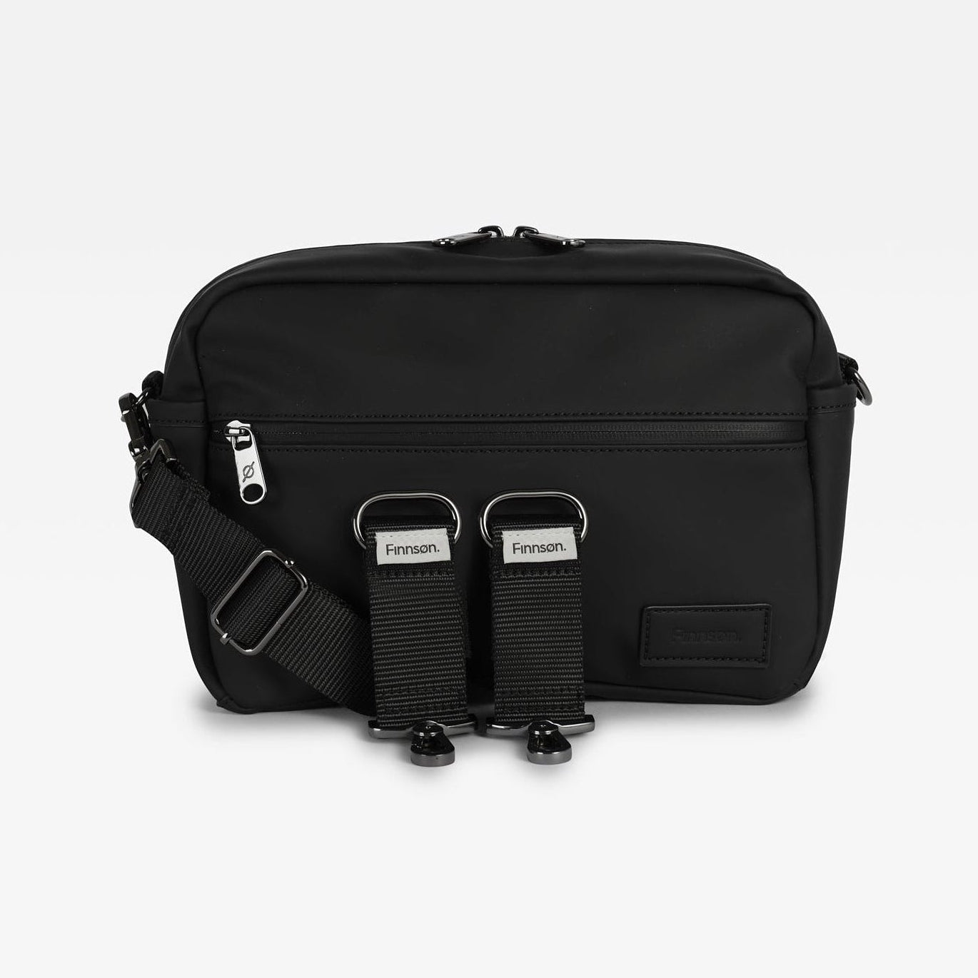 The Fern black stroller organiser with an adjustable shoulder strap and two front webbing loops featuring the 'Ferman' brand name, shown against a light gray background.