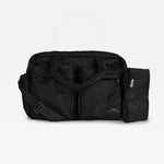 The Finnson Iris changing bag with a detachable shoulder strap and a black changing mat on the side, photographed against a plain light gray background.