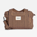 Sanna gingham check patterned bag, set against a plain light gray background.
