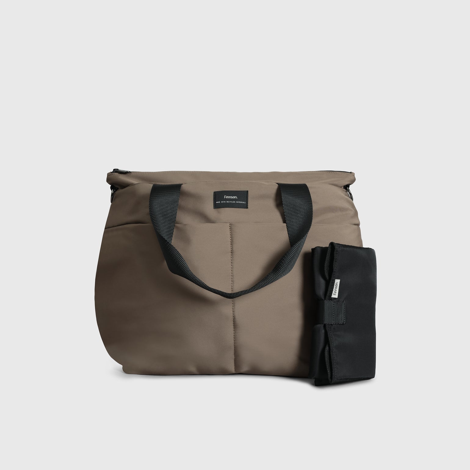 Sigrid Eco Stroller Organiser Bag in Mocha and padded travel changing mat on a light gray background